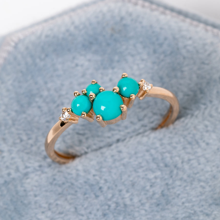 Handmade jewelry with blue turquoise in fun cluster setting