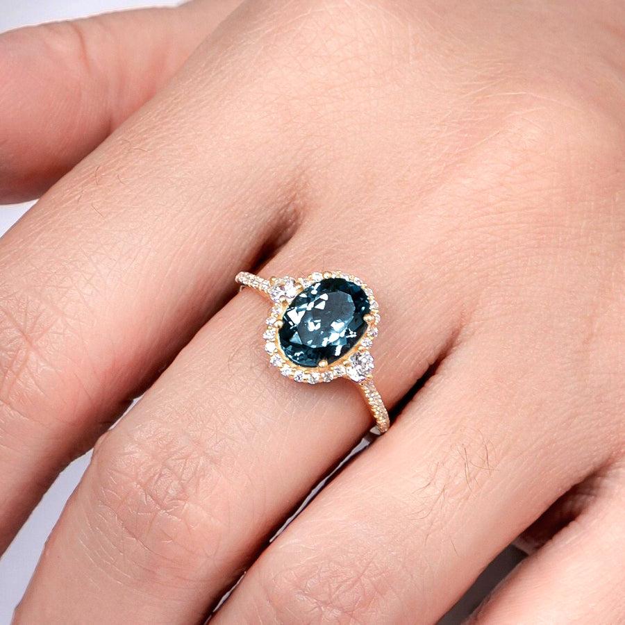 Oval Blue Topaz Engagement Ring