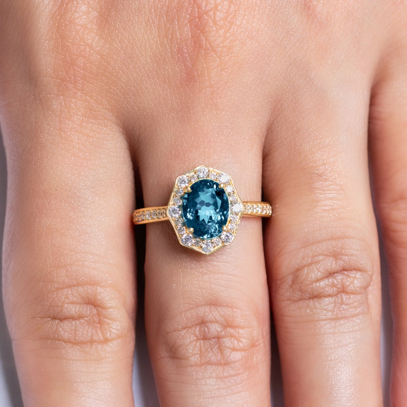 Oval Topaz Halo Ring