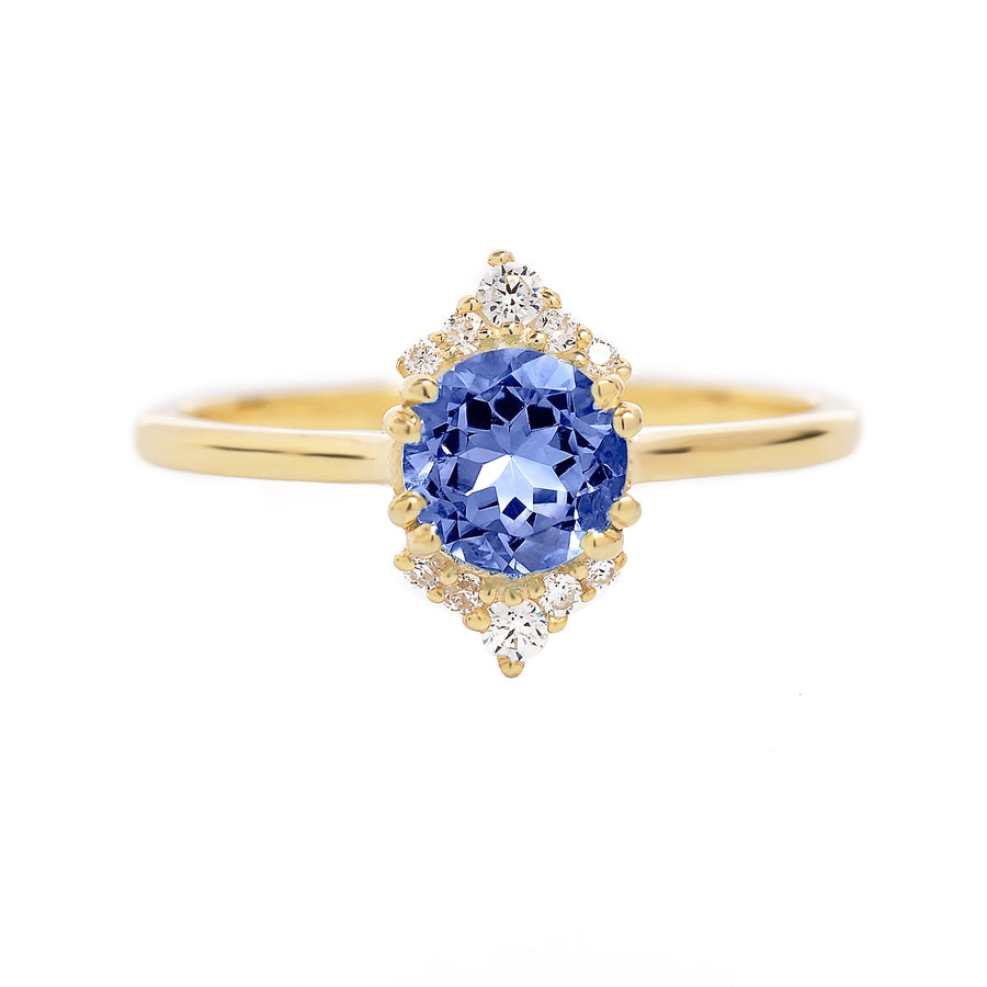 round tanzanite blue ring