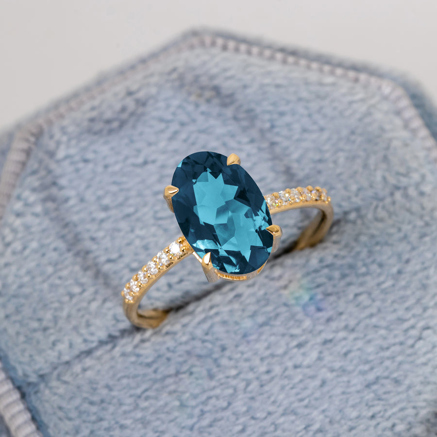 blue topaz eternity ring