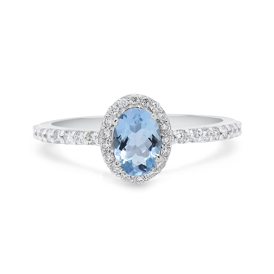 Engagement ring with aquamarine halo and diamonds in white gold