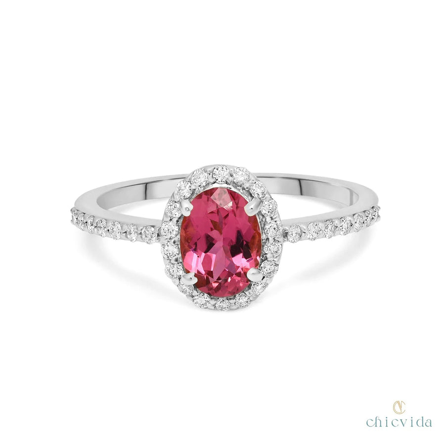 Dainty ring with oval-cut pink tourmaline and gold diamond band