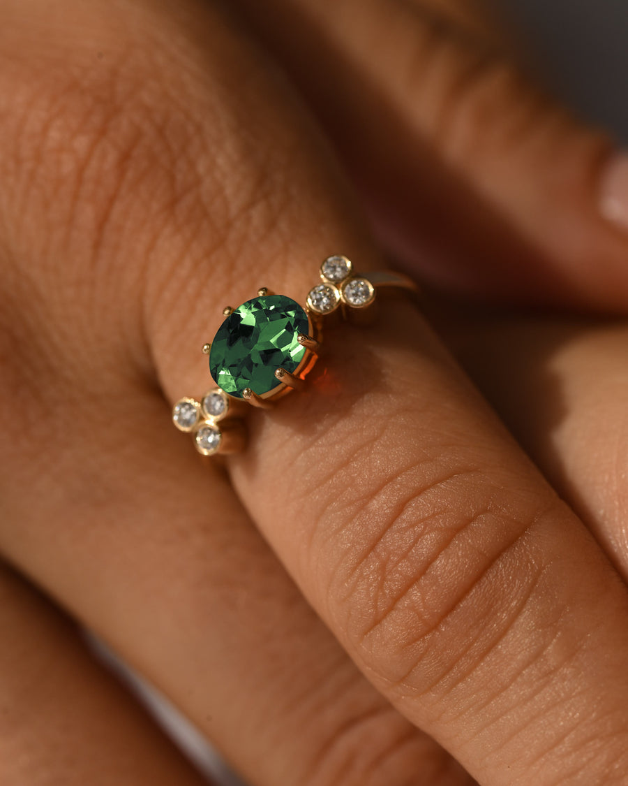 green gemstone cluster ring