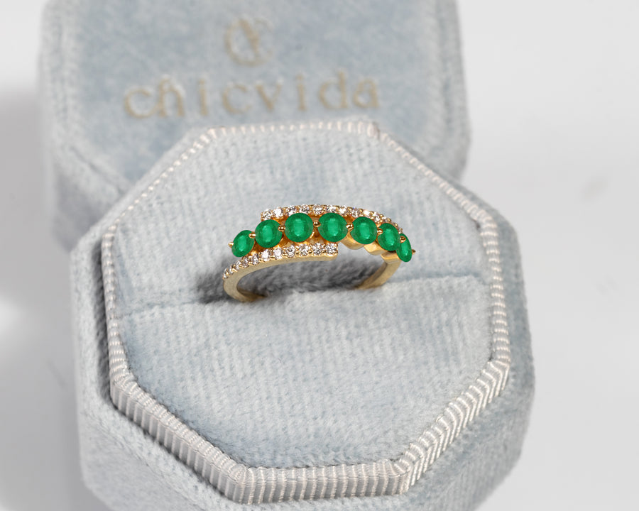 Handmade statement ring with emeralds and diamond accents