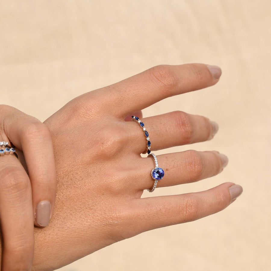 Minimalist bridal ring with tanzanite and diamonds in yellow gold