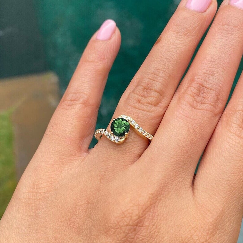 prong set green tourmaline ring